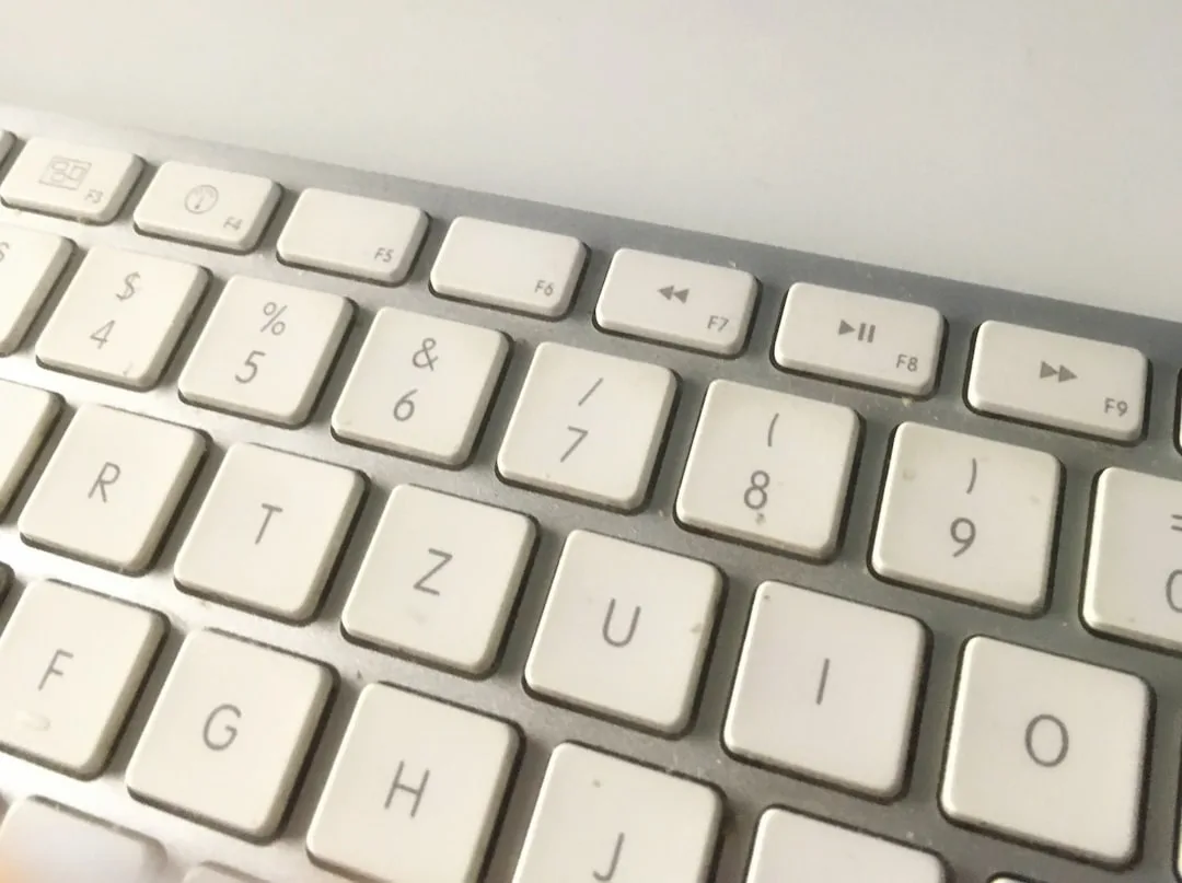 close-up hands typing efficiently