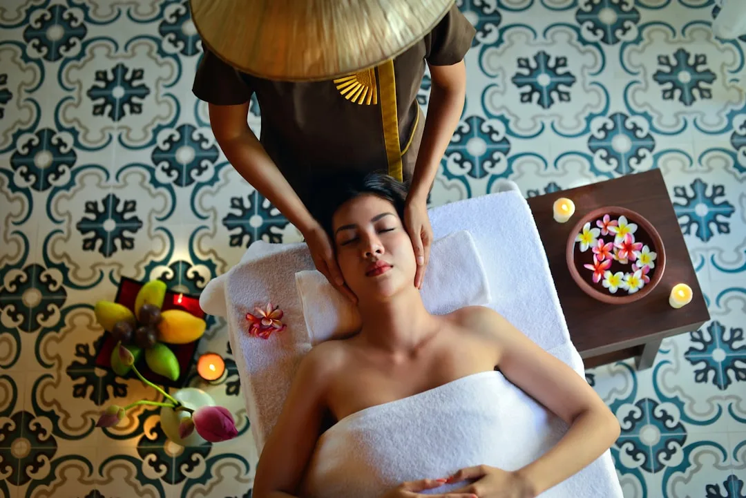 woman relaxing with facial massage